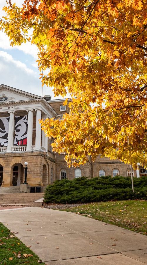 Pedestrians and students walk among the colors of the fall leaves near Bascom Hall at the University of Wisconsin-Madison during autumn on November 11, 2021. (Photo by Bryce Richter / UW-Madison)